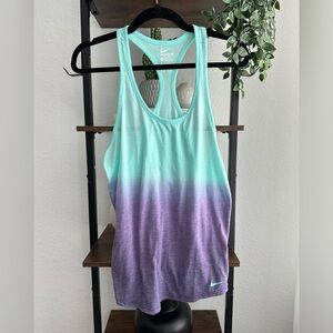 Women’s Nike athletic-cut running tank— size medium.‎